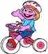 Sesame Street character riding tricycle